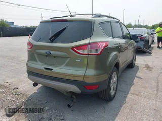 2013 Ford Escape SE z VIN 1FMCU9GX9DUC98437, wystawiony jako IAAI lot #42393299 z przebiegiem 210 014 mil mil oraz . Historia ofert i sprzedaży dostępna na DreamBid. Obrazek 4.