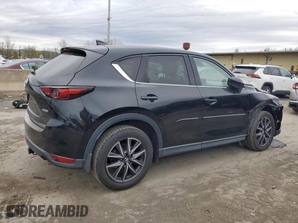 2017 Mazda CX-5 Grand Touring with VIN JM3KFBDL7H0204658, listed as a Copart auction lot 54007165 with 154,546 mi miles and Salvage Title. Bid and sale history available at carsss.com. Image 3.