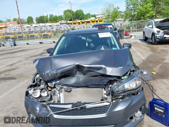 2018 Subaru Impreza Premium with VIN 4S3GTAD60J3705407, listed as a IAAI auction lot 42109867 with 74,014 mi miles and . Bid and sale history available at DreamBid. Image 12.