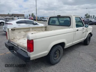 1990 Ford Ranger with VIN 1FTCR10T9LUC08782, listed as a IAAI auction lot 42109025 with 11,839 mi miles and . Bid and sale history available at DreamBid. Image 4.