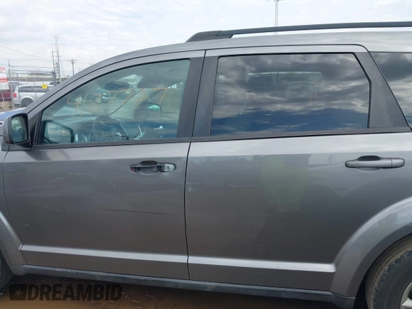 2013 Dodge Journey SXT with VIN 3C4PDCBG6DT506486, listed as a IAAI auction lot 41877271 with 196,597 mi miles and . Bid and sale history available at carsss.com. Image 14.