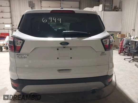 2017 Ford Escape SE with VIN 1FMCU0GD9HUC95707, listed as a IAAI auction lot 41876949 with 125,651 mi miles and . Bid and sale history available at carsss.com. Image 17.