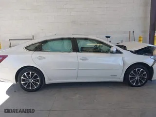 2016 Toyota Avalon Hybrid XLE Premium with VIN 4T1BD1EB2GU048496, listed as a IAAI auction lot 42047633 with 68,900 mi miles. Bid and sale history available at carsss.com. Image 13.
