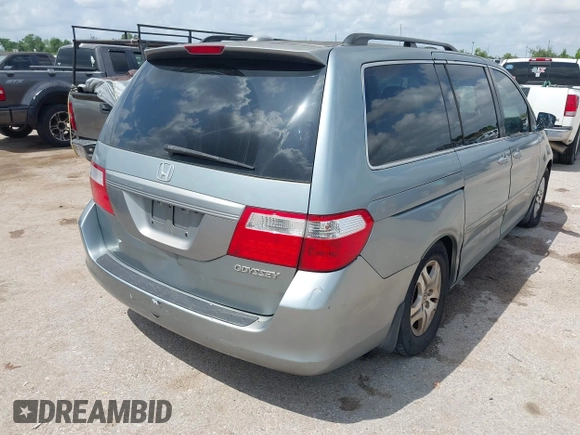 2005 Honda Odyssey EX-L with VIN 5FNRL38735B118506, listed as a IAAI auction lot 42101540 with 159,688 mi miles. Bid and sale history available at carsss.com. Image 4.
