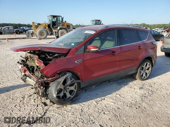 2017 Ford Escape Titanium with VIN 1FMCU0J97HUD52930, listed as a Copart auction lot 71851014 with 101,467 mi miles and Salvage Title. Bid and sale history available at carsss.com. Image 1.