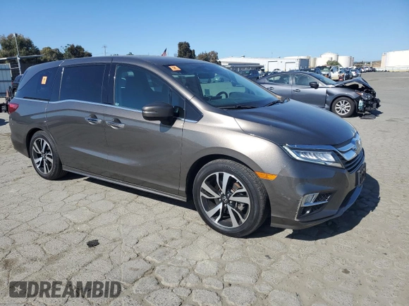 2020 Honda Odyssey Elite with VIN 5FNRL6H96LB037046, listed as a Copart auction lot 56552475 with 51,363 mi miles and Salvage title. Bid and sale history available at DreamBid. Image 4.