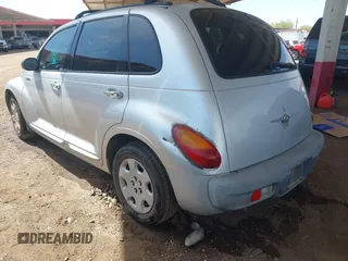 2003 Chrysler PT Cruiser with VIN 3C4FY48B93T551745, listed as a IAAI auction lot 41928591 with 213,718 mi miles. Bid and sale history available at carsss.com. Image 3.