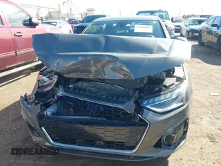 2023 Audi A4 S line Premium Plus z VIN WAUEAAF41PN003020, wystawiony jako IAAI lot #42369885 z przebiegiem 55 960 mil mil oraz . Historia ofert i sprzedaży dostępna na DreamBid. Obrazek 11.