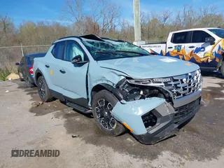 2023 Hyundai Santa Cruz SEL z VIN 5NTJC4AE4PH042943, wystawiony jako IAAI lot #41807647 z przebiegiem Nie podano mil oraz . Historia ofert i sprzedaży dostępna na DreamBid. Obrazek 1.