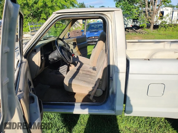 1990 Ford Ranger with VIN 1FTCR10T5LUB33370, listed as a Copart auction lot 56433285 with 110,895 mi miles and Clean title. Bid and sale history available at DreamBid. Image 6.