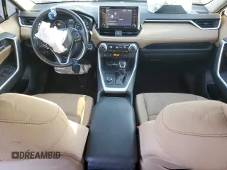 2021 Toyota RAV4 Hybrid XLE with VIN JTMRWRFV0MD117606, listed as a Copart auction lot 52412695 with 64,682 mi miles and Salvage Title. Bid and sale history available at carsss.com. Image 8.
