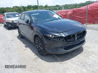 2024 Mazda CX-30 S Select Sport with VIN 3MVDMBBM3RM647261, listed as a IAAI auction lot 42643948 with 27,452 mi miles and . Bid and sale history available at DreamBid. Image 1.