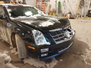 2010 Cadillac STS AWD with VIN 1G6DU6EV2A0125065, listed as a IAAI auction lot 41229886 with 84,954 mi miles and . Bid and sale history available at DreamBid. Image 18.