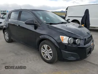 2012 Chevrolet Sonic LT with VIN 1G1JC6SB7C4200604, listed as a Copart auction lot 52843945 with 101,039 mi miles and Salvage Title. Bid and sale history available at carsss.com. Image 4.