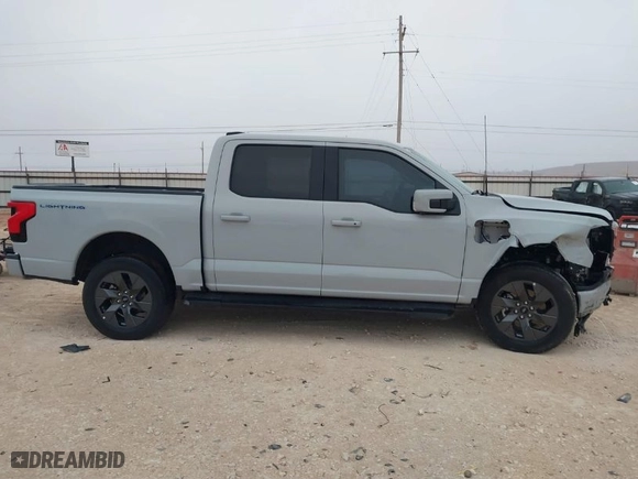2023 Ford F-150 Lightning Pro with VIN 1FTVW1EL7PWG19070, listed as a IAAI auction lot 41536193 with 22,654 mi miles. Bid and sale history available at carsss.com. Image 14.