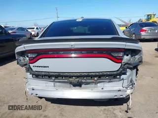 2022 Dodge Charger SXT with VIN 2C3CDXBG3NH231325, listed as a IAAI auction lot 41667810 with 74,967 mi miles and . Bid and sale history available at DreamBid. Image 17.