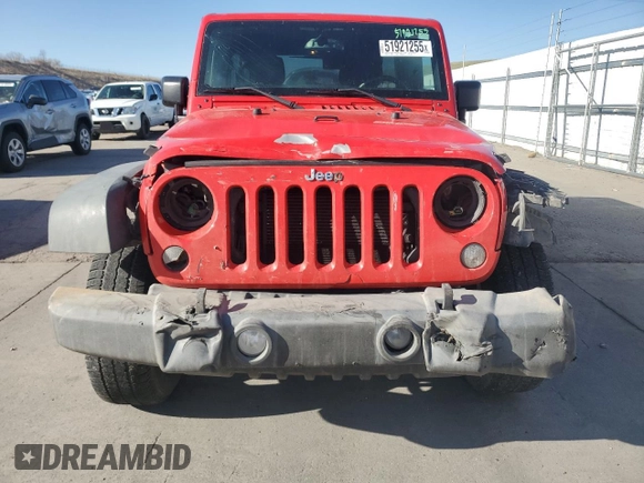 2015 Jeep Wrangler Unlimited Willys Wheeler with VIN 1C4BJWDG8FL574014, listed as a Copart auction lot 51921255 with 54,134 mi miles and Salvage Title. Bid and sale history available at DreamBid. Image 5.