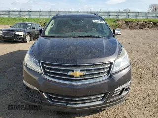 2014 Chevrolet Traverse LTZ z VIN 1GNKVJKD5EJ212952, wystawiony jako Copart lot #54815805 z przebiegiem 185 329 mil mil oraz Czysty tytuł • Clean title. Historia ofert i sprzedaży dostępna na DreamBid. Obrazek 5.