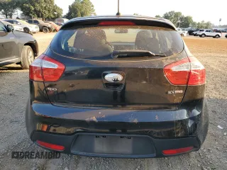 2014 Kia Rio EX with VIN KNADN5A34E6325423, listed as a Copart auction lot 69116324 with 104,083 mi miles and Salvage Title. Bid and sale history available at carsss.com. Image 6.