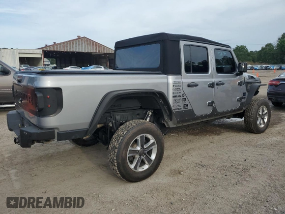 2020 Jeep Gladiator Sport S with VIN 1C6HJTAG9LL127546, listed as a Copart auction lot 54955945 with 99,511 mi miles and Salvage title. Bid and sale history available at DreamBid. Image 3.