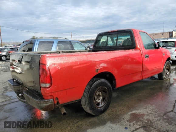 2001 Ford F-150 XL z VIN 3FTZF17291MA72686, wystawiony jako Copart lot #83103904 z przebiegiem 126 018 mil mil oraz Szkoda całkowita • Salvage title. Historia ofert i sprzedaży dostępna na DreamBid. Obrazek 3.