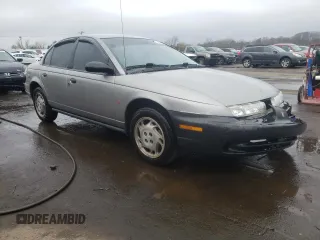 1996 Saturn SL with VIN 1G8ZK5272TZ265571, listed as a Copart auction lot 51267475 with 142,824 mi miles and Salvage Title. Bid and sale history available at carsss.com. Image 4.