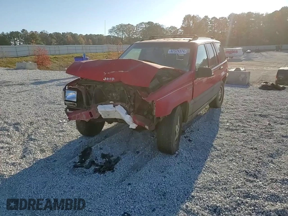 1995 Jeep Grand Cherokee Laredo with VIN 1J4GZ58S7SC747906, listed as a Copart auction lot 82529374 with 73,932 mi miles and Salvage Title. Bid and sale history available at carsss.com. Image 11.