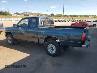 1995 Toyota T100 z VIN JT4VD22F4S0006698, wystawiony jako Copart lot #76022924 z przebiegiem 457 624 mil mil oraz Tytuł czysty. Historia ofert i sprzedaży dostępna na DreamBid. Obrazek 2.