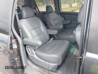 2004 Honda Odyssey EX-L with VIN 5FNRL18064B066763, listed as a IAAI auction lot 42588622 with 499,993 mi miles and . Bid and sale history available at DreamBid. Image 8.