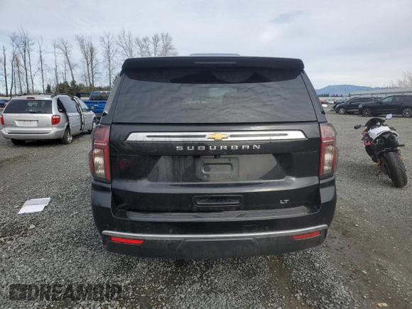 2023 Chevrolet Suburban LT with VIN 1GNSCCKD3PR125671, listed as a Copart auction lot 46734575 with 158,217 mi miles and Salvage title. Bid and sale history available at DreamBid. Image 6.