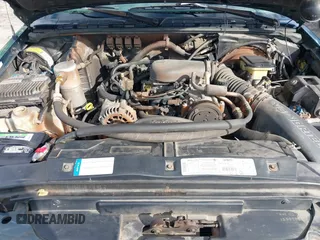 1997 GMC Sonoma SLS with VIN 1GTCS19X4V8528209, listed as a IAAI auction lot 41576867 with 217,993 mi miles. Bid and sale history available at carsss.com. Image 10.