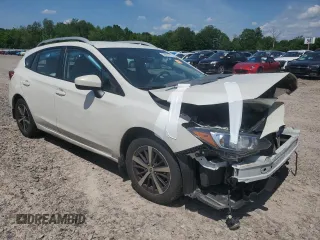 2022 Subaru Impreza Premium with VIN 4S3GTAV63N3718494, listed as a Copart auction lot 59867675 with 153,018 mi miles and Salvage title. Bid and sale history available at DreamBid. Image 4.