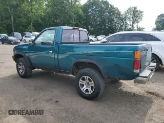 1997 Nissan Frontier XE with VIN 1N6SD11Y4VC346711, listed as a Copart auction lot 61025615 with 100,417 mi miles and Clean title. Bid and sale history available at DreamBid. Image 2.