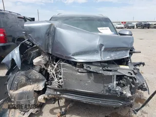 2024 Volkswagen Atlas SE z VIN 1V2JE2CA1RC252078, wystawiony jako IAAI lot #42061482 z przebiegiem 10 396 mil mil oraz . Historia ofert i sprzedaży dostępna na DreamBid. Obrazek 13.