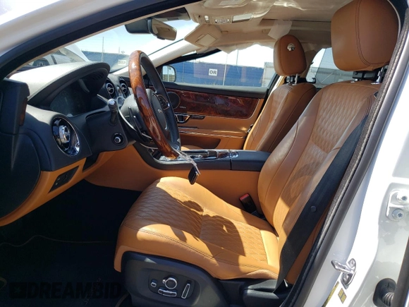 2019 Jaguar XJ Portfolio with VIN SAJWA2G72K8W21087, listed as a Copart auction lot 66017344 with 22,671 mi miles and Salvage Title. Bid and sale history available at DreamBid. Image 7.