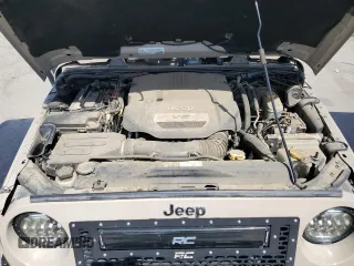 2016 Jeep Wrangler Unlimited Rubicon z VIN 1C4HJWFGXGL236560, wystawiony jako Copart lot #57528355 z przebiegiem 64 634 mil mil oraz Szkoda całkowita • Salvage title. Historia ofert i sprzedaży dostępna na DreamBid. Obrazek 12.
