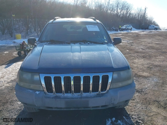 2002 Jeep Grand Cherokee Laredo with VIN 1J4GW48NX2C243282, listed as a IAAI auction lot 41362493 with 201,932 mi miles. Bid and sale history available at carsss.com. Image 6.