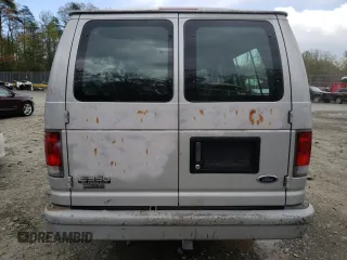 1999 Ford Econoline Passenger XL with VIN 1FBSS31LXXHA39417, listed as a Copart auction lot 52817645 with 109,930 mi miles and Salvage title. Bid and sale history available at DreamBid. Image 6.