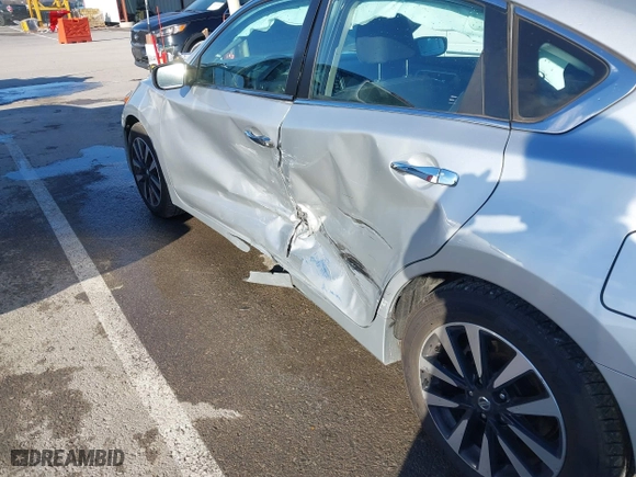 2018 Nissan Altima 2.5 SV with VIN 1N4AL3APXJC265944, listed as a IAAI auction lot 41052902 with 142,023 mi miles. Bid and sale history available at carsss.com. Image 17.