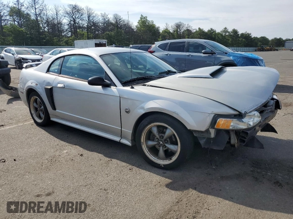 2004 Ford Mustang GT Deluxe with VIN 1FAFP42X74F208831, listed as a Copart auction lot 62903735 with 44,279 mi miles and Clean title. Bid and sale history available at DreamBid. Image 4.