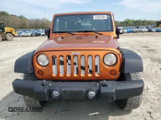 2011 Jeep Wrangler Sport with VIN 1J4AA2D15BL574234, listed as a Copart auction lot 52952605 with 114,642 mi miles and Salvage Title. Bid and sale history available at carsss.com. Image 5.