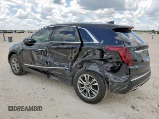 2021 Cadillac XT5 FWD Premium Luxury with VIN 1GYKNCRS0MZ100515, listed as a Copart auction lot 62856785 with 50,298 mi miles and Salvage title. Bid and sale history available at DreamBid. Image 2.