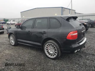 2009 Porsche Cayenne Turbo with VIN WP1AC29P69LA83418, listed as a Copart auction lot 87115384 with 129,437 mi miles and Clean Title. Bid and sale history available at carsss.com. Image 2.