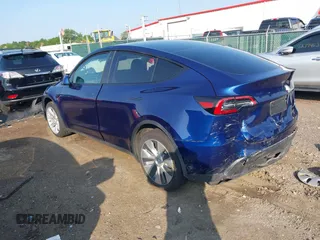 2023 Tesla Model Y Long Range with VIN 7SAYGDEE0PF671726, listed as a IAAI auction lot 42393616 with Not provided miles and . Bid and sale history available at DreamBid. Image 3.