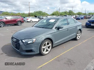 2019 Audi A3 Premium with VIN WAUAUGFF1K1011810, listed as a IAAI auction lot 41085240 with 51,644 mi miles and . Bid and sale history available at DreamBid. Image 18.