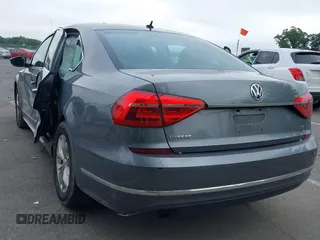2016 Volkswagen Passat S with VIN 1VWAT7A30GC054210, listed as a IAAI auction lot 42452304 with 119,842 mi miles and . Bid and sale history available at DreamBid. Image 3.
