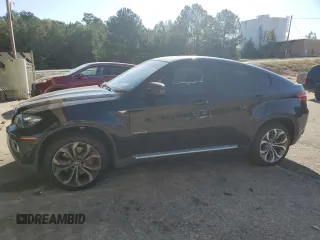 2014 BMW X6 50i z VIN 5UXFG8C54EL593085, wystawiony jako Copart lot #75775084 z przebiegiem Nie podano mil oraz Szkoda całkowita • Salvage title. Historia ofert i sprzedaży dostępna na DreamBid. Obrazek 1.