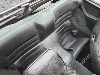 1987 Porsche 944 z VIN WP0AB0946HN474232, wystawiony jako Copart lot #64654684 z przebiegiem 87 126 mil mil oraz Szkoda całkowita • Salvage title. Historia ofert i sprzedaży dostępna na DreamBid. Obrazek 10.