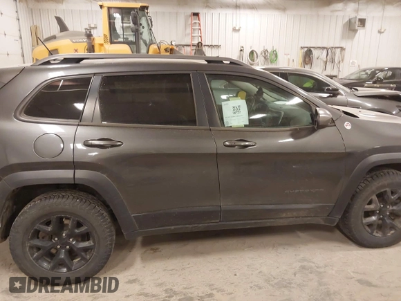 2015 Jeep Cherokee Trailhawk с VIN 1C4PJMBSXFW525218, выставлен на аукционе IAAI как лот 42032130 с пробегом 164 289 миль миль и . История ставок и продаж доступна на DreamBid. Изображение 13.