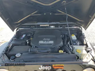 2012 Jeep Wrangler Sport z VIN 1C4AJWAG9CL257841, wystawiony jako Copart lot #57731255 z przebiegiem 112 614 mil mil oraz Szkoda całkowita • Salvage title. Historia ofert i sprzedaży dostępna na DreamBid. Obrazek 11.